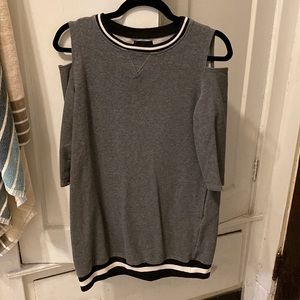 Cap sleeve sweatshirt dress with elastic band on the bottom.